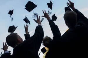 Graduates Throw Their Caps