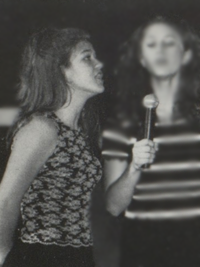 Kelly Clarkson 1999 high school yearbook photo - singing National Anthem