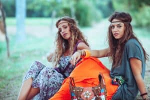 Two Women Are Sitting On the Grass